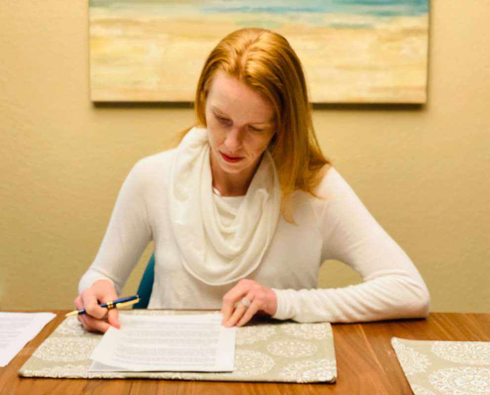 Susan signing her contract with Gnome Road. Photo Credit: Steven Taylor